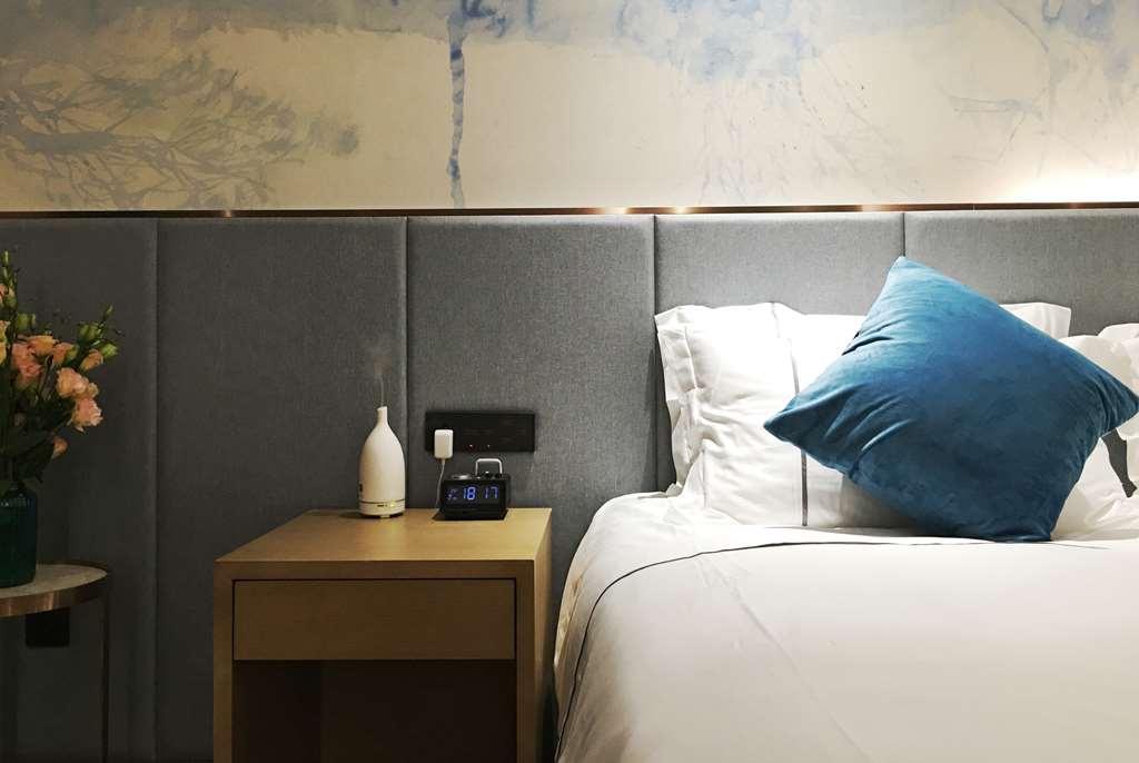 Ramada Encore Hangzhou Aoti Стая снимка